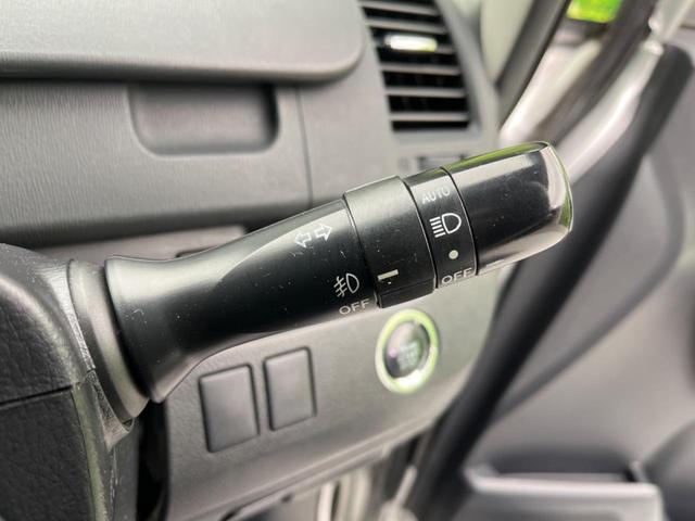 Si フリップダウンモニター 両側電動スライドドア 禁煙車 純正ナビ バックカメラ ETC HIDヘッド スマートキー 革巻きステアリング 純正16インチアルミ フロントフォグ オートライト オートエアコン(36枚目)