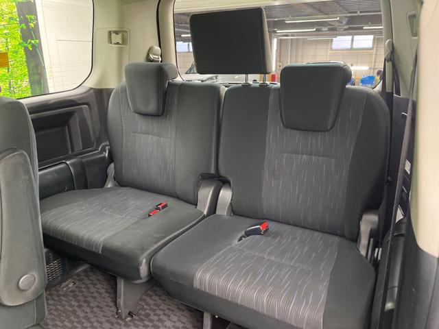 Si フリップダウンモニター 両側電動スライドドア 禁煙車 純正ナビ バックカメラ ETC HIDヘッド スマートキー 革巻きステアリング 純正16インチアルミ フロントフォグ オートライト オートエアコン(49枚目)