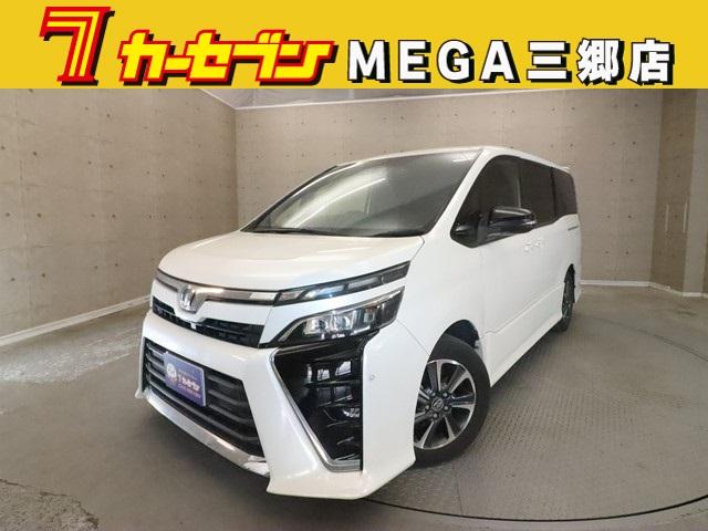 ヴォクシー(トヨタ) ＺＳ　７人乗り　メモリーナビ　後席フリップダウンモニター　両側電動スライド　衝突被害軽減システム　フルセグ／ＤＶＤ／Ｂｌｕｅｔｏｏｔｈ対応 中古車画像