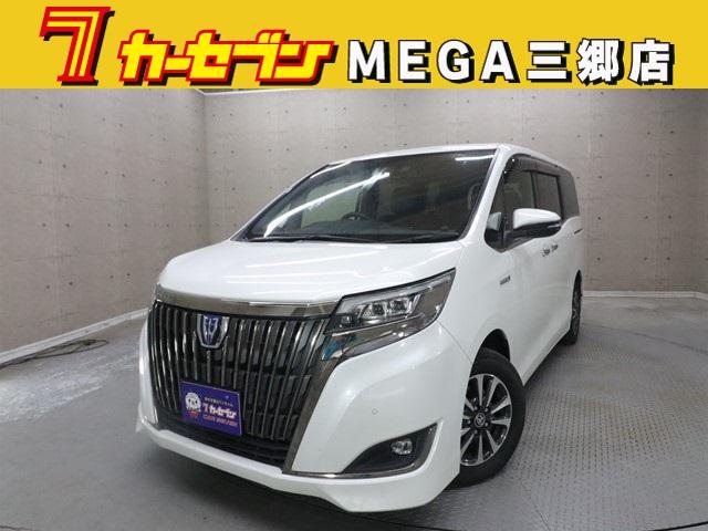 エスクァイア(トヨタ) ハイブリッドＧｉプレミアムパッケジブラックテーラード　１０インチ純正ナビ　後席モニター　両側パワースライドドア　フルセグ　バックカメラ　ＥＴＣ　ＬＥＤヘッドランプ　衝突被害軽減システム　ステアリングヒーター　前後ドラレコ　車線逸脱警報 中古車画像