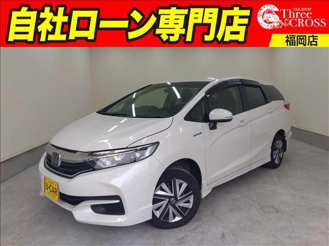 シャトル(ホンダ) ハイブリッド　ホンダセンシング　４ＷＤ　ＳＤナビ　Ｂｌｕｅｔｏｏｔｈ　ＥＴＣ　プッシュスタート 中古車画像