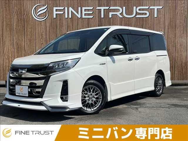 ノア ハイブリッドＳｉ　ダブルバイビーＩＩ　純正１０インチナビ　両側パワースライドドア　衝突軽減ブレーキ　モデリスタエアロ　バックカメラ　ＥＴＣ２．０　Ｂｌｕｅｔｏｏｔｈ　フルセグＴＶ　禁煙車　シートヒーター　ＬＥＤヘッドライト　スマートキー（1枚目）