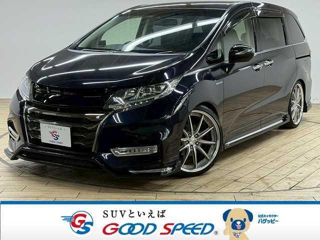 オデッセイハイブリッド(ホンダ) ◆ＨＹＢＲＩＤ　ＡＢＳＯＬＵＴＥ　ＥＸ　Ｈｏｎｄａ　ＳＥＮＳ　禁煙／エアロ／フリップダウン／４本マフラ−／衝突軽減／／純正ナビ／全周囲／シートヒーター／ＡＣ１００Ｖ／ＨＤＭＩ／パワーシート／オットマン／レーダークルーズ／ステアリングスイッチ／ブレーキホールド／ 中古車画像