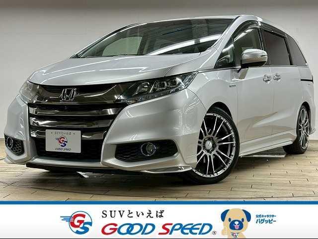オデッセイハイブリッド(ホンダ) ＡＢＳＯＬＵＴＥ　Ｈｏｎｄａ　ＳＥＮＳＩＮＧ　ＥＸＰ　禁煙車／全周囲／フリップダウン／衝突軽減／両側パワースライド／レーダークルーズ／レーンキープ／Ｗエアコン／ＨＤＭＩ／ブラインドスポット／ＡＣ１００Ｖ／ハーフレザー／ステアリングスイッチ 中古車画像