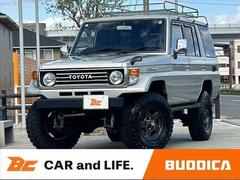 ランドクルーザー70 LX 4WD リフトアップ 社外ハンドル 社外SDナビ フルセグ Bluetooth ETC スペアキー Rガラスフィルム施工 ルーフキャリア フロアマット ドアバイザー 中古車画像