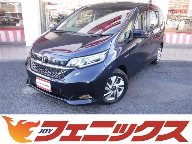 フリードハイブリッド(ホンダ) ハイブリッド・Gホンダセンシング☆純正9型ナビ☆バックカメラ ☆フリップダウンモニター☆フルセグTV☆ホンダセンシング☆ACC☆LKAS☆両側パワスラ☆ビルトインETC☆前後ドラレコ付デジタルミラー☆LEDヘッドライト☆前席シートヒーター☆禁煙車★試乗予約承り中 中古車画像