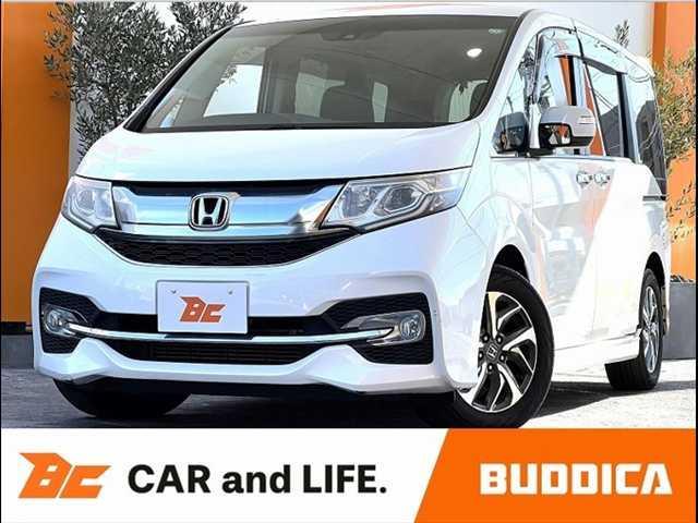 ステップワゴンスパーダ(ホンダ) スパーダ　ホンダセンシング　禁煙　車検整備付　ホンダセンシング　両電スラ　９インチナビ　ＥＴＣ　ＬＥＤ　フルセグ　Ｂモニタ　ＢＴオーディオ　スマートキー　Ｐスタート　オートライト　純１６インチＡＷ　レザーステア　クルコン 中古車画像