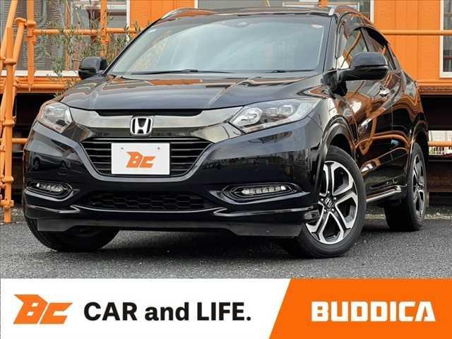 ヴェゼル(ホンダ) ハイブリッドＺ・ホンダセンシング　中期　車検整備付　禁煙　８型純正ナビ　ホンダセンシング　Ｂｌｕｅｔｏｏｔｈ　バックカメラ　フルセグ　前席シートヒーター　スマートキー×２　レーダークルコン　電動バーキングプレーキ　ＡＢＳ 中古車画像