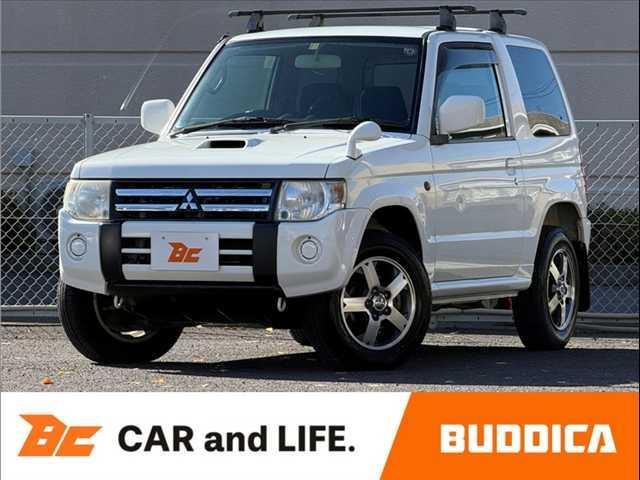 パジェロミニ(三菱) ＶＲ　ナビ　４ＷＤ　ミュージックサーバー　ＤＶＤ再生　ターボ　電動格納ミラー　Ｐガラス　ＵＶカット　ＡＣソケット　ルーフキャリア　ヘッドライトレベライザー　シートリフター　背面タイヤ　リアワイパー 中古車画像