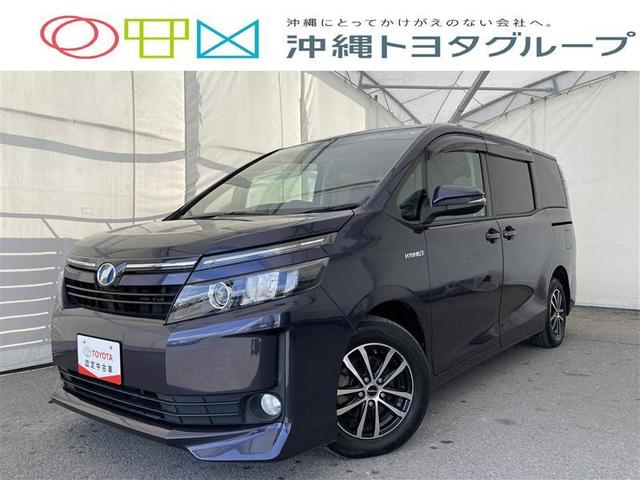 沖縄県の中古車ならヴォクシー ハイブリッドＶ　フルセグ　メモリーナビ　ＤＶＤ再生　ミュージックプレイヤー接続可　バックカメラ　ＥＴＣ　両側電動スライド　乗車定員７人　３列シート　アイドリングストップ