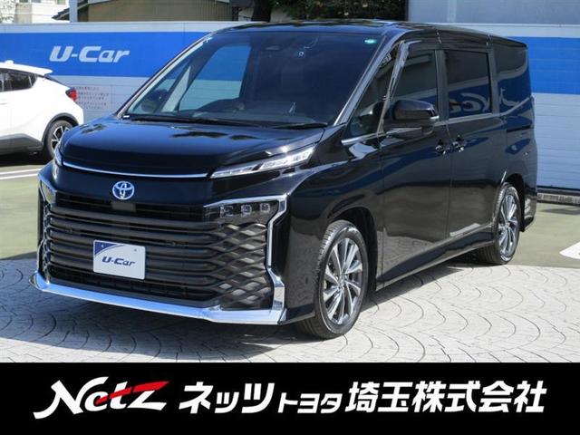 ヴォクシー ハイブリッドＳ－Ｚ　パワーウィンドウ　ＤＶＤ再生機能　インテリキー　横滑防止装置　地デジＴＶ　アクティブクルーズコントロール　１オナ　フルオートエアコン　リアカメラ　エアバッグ　ＡＢＳ　１００Ｖ充電　ナビＴＶ　ＷＡＣ（1枚目）