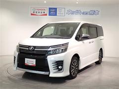ヴォクシー ZS 煌 フルセグ メモリーナビ DVD再生 後席モニター バックカメラ 衝突被害軽減システム ETC 両側電動スライド LEDヘッドランプ ウオークスルー 乗車定員7人 3列シート 記録簿 中古車画像