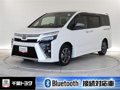 ヴォクシー ZS 煌III 乗車定員7人 アルミホイール 両側電動スライド ウオークスルー LEDヘッドランプ 記録簿 キーレス CD Wエアコン 盗難防止装置 アイドリングストップ オートクルーズコントロール メモリーナビ 中古車画像