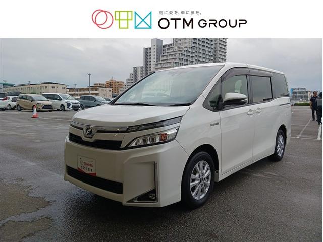 沖縄県の中古車ならヴォクシー ハイブリッドＶ　フルセグ　メモリーナビ　ＤＶＤ再生　ミュージックプレイヤー接続可　バックカメラ　衝突被害軽減システム　ＥＴＣ　ドラレコ　両側電動スライド　ＬＥＤヘッドランプ　乗車定員７人　３列シート　記録簿