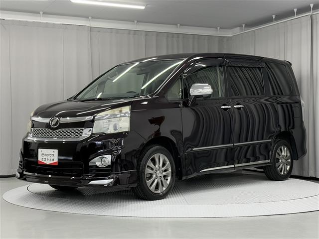 ヴォクシー ＺＳ　煌ＩＩＩ　４ＷＤ　寒冷地　ＨＤＤナビ　両側電動スライド　フルセグ　ＨＩＤヘッドライト　アルミホイール　スマートキー　ＥＴＣ　盗難防止装置　キーレス　３列シート　ウオークスルー　乗車定員７人（1枚目）