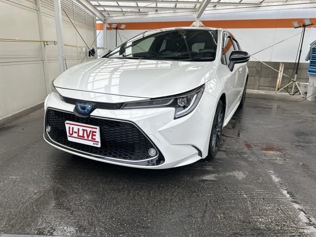 カローラツーリング ハイブリッド ダブルバイビー 追突軽減ブレーキ バックモニタ 横滑防止 スマキー LEDライト Aストップ デュアルエアバッグ エアコン オートクルーズ サイドエアバッグ ETC付 PS キーフリー ABS エアバック ワンオナ(1枚目)