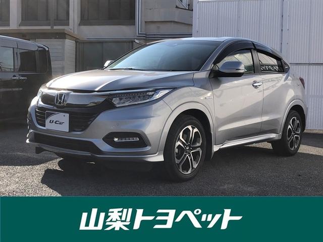 ヴェゼル(ホンダ) ハイブリッドＺ・ホンダセンシング　ミュージックプレイヤー接続可　整備記録簿　横滑防止装置　バックガイドモニター　ＬＥＤライト　ナビＴＶ　ＡＣ　アルミ　メモリーナビ　サイドエアバック　アクティブクルーズコントロール　寒冷地仕様　ＡＢＳ 中古車画像