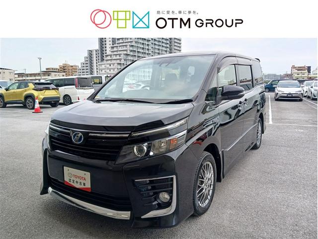 沖縄県豊見城市の中古車ならヴォクシー ハイブリッドＺＳ　フルセグ　メモリーナビ　ＤＶＤ再生　ミュージックプレイヤー接続可　バックカメラ　衝突被害軽減システム　ＥＴＣ　ドラレコ　両側電動スライド　ＬＥＤヘッドランプ　乗車定員７人　３列シート　記録簿