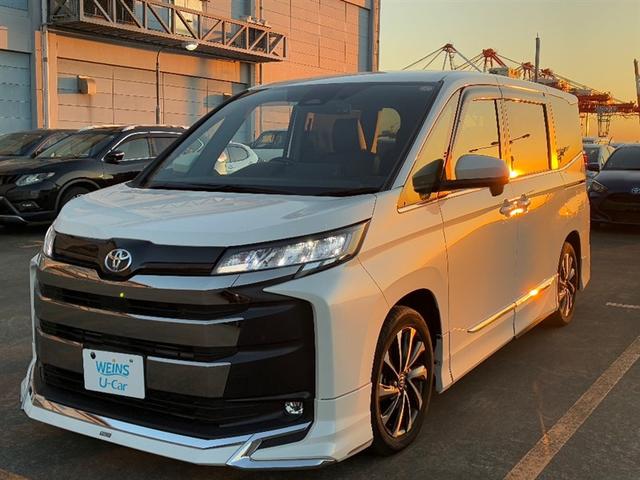 ノア(トヨタ) Ｓ−Ｚ　アルミホイール　クルーズコントロール　盗難防止装置　ＬＥＤライト　両側自動ドア　メモリーナビ　キーレス　横滑り防止　ナビＴＶ　三列シート　ＤＶＤ再生　ミュージックプレイヤー接続可　スマートキー　ＥＴＣ 中古車画像