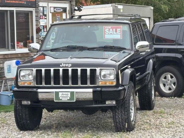 ジープ・チェロキー リミテッド　Ｘｊ最終型　４ＷＤ　ドライブレコーダー　オートクルーズコントロール　パワーシート　ＴＶ　アルミホイール　革シート　ＡＴ　ＡＢＳ　エアコン　キーレス（50枚目）