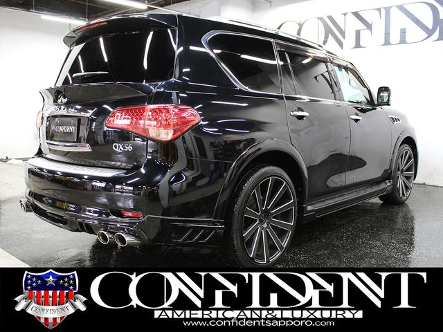 ＱＸ５６ 　テクノロジーＰＫＧ　新車並行車　スマートキー　ＲＯＷＥＮエアロ　２４インチＡＷ　トミーカイラマフラー　ルーフレール　電動格納ミラー　ハンドルヒーター　シートヒーター・クーラー　ヘッドレストモニター（8枚目）