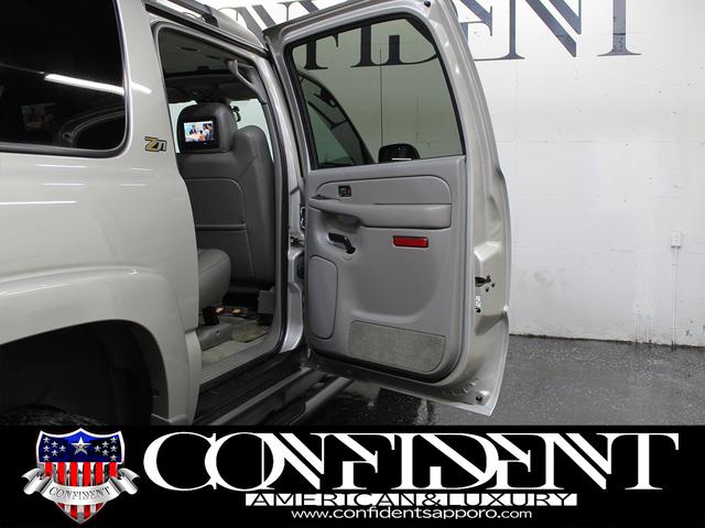 シボレーサバーバン 　Ｚ７１　４ＷＤ　７人乗り　レザーシート　セカンドキャプテンシート　オートチェック付き　　ミッキートンプソン１６インチＡＷ　グッドリッチオールテレーン　地デジナビ・バックカメラ　サンルーフ（24枚目）