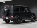 Ｇ６３　ＡＭＧナイトＰＫＧ仕様　Ｇ．ｍａｎｕｆａｋｔｕｒプログラム　マットブラックＡＭＧ２１インチＡＷ　ボディ同色スペアタイヤリング　ベージュシートベルト　フリップダウンモニター　ブラックランニングボード（11枚目）