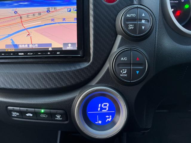 フィットハイブリッド スマートセレクション　禁煙　社外ナビ　バックカメラ　Ｂｌｕｅｔｏｏｔｈ　ＴＶ　クルコン　ＨＩＤ　スマートキー　タイミングチェーン　ルーフスポイラー　マットガード（26枚目）