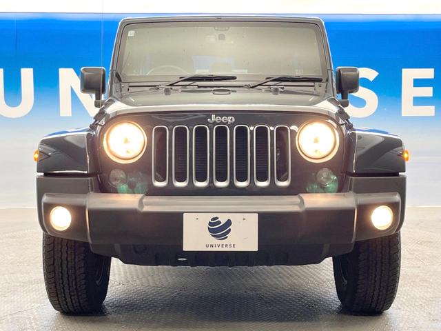 ジープ・ラングラーアンリミテッド サハラ SAHARA刺?入り黒革シート シートヒーター クルーズコントロール メモリナビ バック/サイドカメラ フルセグ Bluetooth接続 オートライト 純正18インチアルミホイール ETC車載器(15枚目)