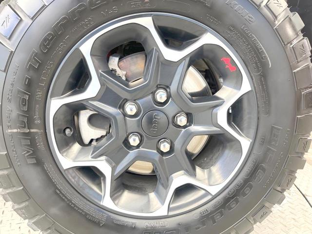 ジープ・ラングラーアンリミテッド ルビコンリミテEDウィズサンライダフリTフォーハドT 250台限定特別仕様車 黒革シート 前席シートヒーター アダプティブクルーズコントロール LEDヘッドライト 純正ナビ バックカメラ ALPINEスピーカー ダウンヒルアシスト(48枚目)