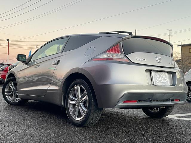 CR-Z α 禁煙車/ETC/HID/オートライト/クルーズコントロール/スマートキー/パドルシフト/オートAC/CDオーディオ/ミラーウィンカー/プライバシーガラス/フォグ/純正アルミ/シートリフター/Tチェーン(31枚目)