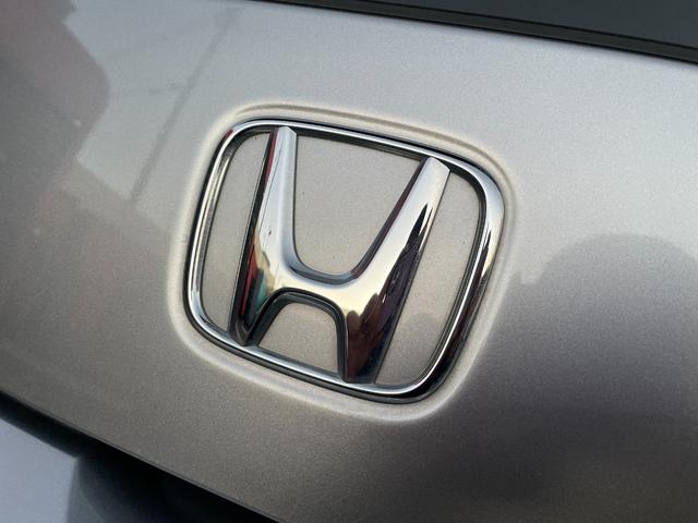 CR-Z α 禁煙車/ETC/HID/オートライト/クルーズコントロール/スマートキー/パドルシフト/オートAC/CDオーディオ/ミラーウィンカー/プライバシーガラス/フォグ/純正アルミ/シートリフター/Tチェーン(40枚目)