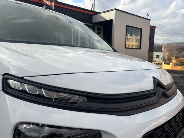 ベルランゴ マックス ブルーHDi リフトアップ BFGoodrichホワイトレタータイヤ ワンオーナー 禁煙車 パノラミックルーフ 両側スライドドア ETC フロントグリル・エンブレムブラックアウト ミシュランスタッドレス付(5枚目)