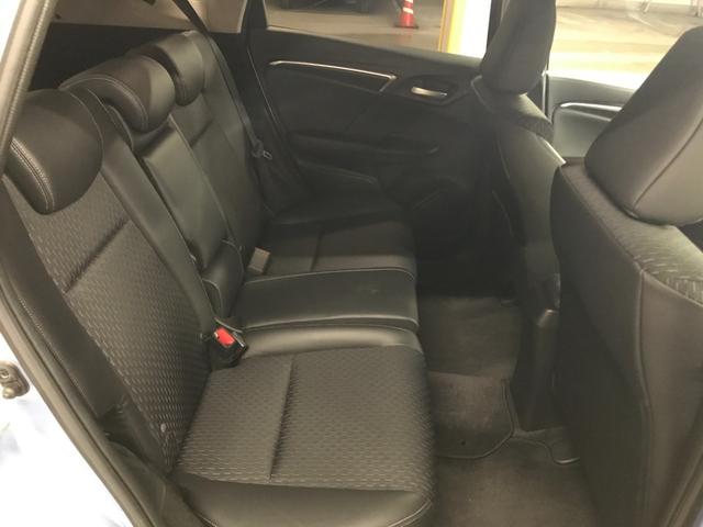 フィットハイブリッド Ｌパッケージ　インターナビセット／純正ナビ／バックカメラ／フルセグＴＶ／ＣＤ／ＤＶＤ／ＢＴオーディオ／ＵＳＢ／ＨＤＭＩ／社外ＨＫＳマフラー／衝突軽減ブレーキ／前方ドラレコ／クルコン／合皮コンビシート／ＥＴＣ（15枚目）