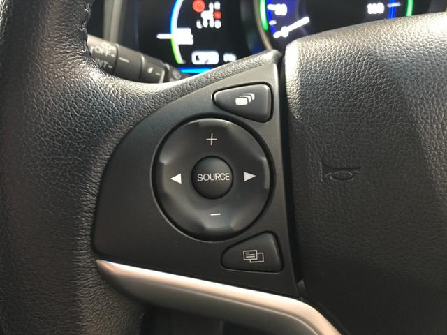 フィットハイブリッド Ｌパッケージ　インターナビセット／純正ナビ／バックカメラ／フルセグＴＶ／ＣＤ／ＤＶＤ／ＢＴオーディオ／ＵＳＢ／ＨＤＭＩ／社外ＨＫＳマフラー／衝突軽減ブレーキ／前方ドラレコ／クルコン／合皮コンビシート／ＥＴＣ（26枚目）