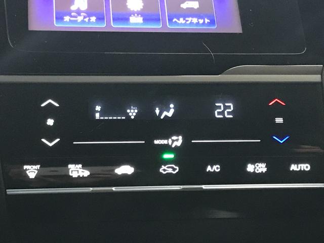 フィットハイブリッド Ｌパッケージ　インターナビセット／純正ナビ／バックカメラ／フルセグＴＶ／ＣＤ／ＤＶＤ／ＢＴオーディオ／ＵＳＢ／ＨＤＭＩ／社外ＨＫＳマフラー／衝突軽減ブレーキ／前方ドラレコ／クルコン／合皮コンビシート／ＥＴＣ（31枚目）