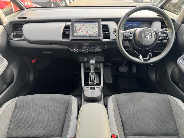 フィット e:HEV RS ワンオーナー 純正8インチナビTV バックカメラ オートLED ハーフ合皮シート スマートキー ホンダセンシング 追従クルコン パーキングセンサー 純正16インチアルミ(3枚目)