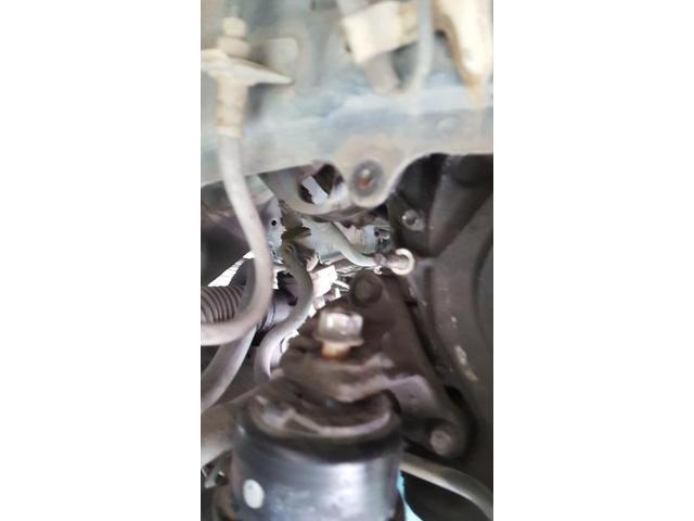 オートテンショナーASSY交換