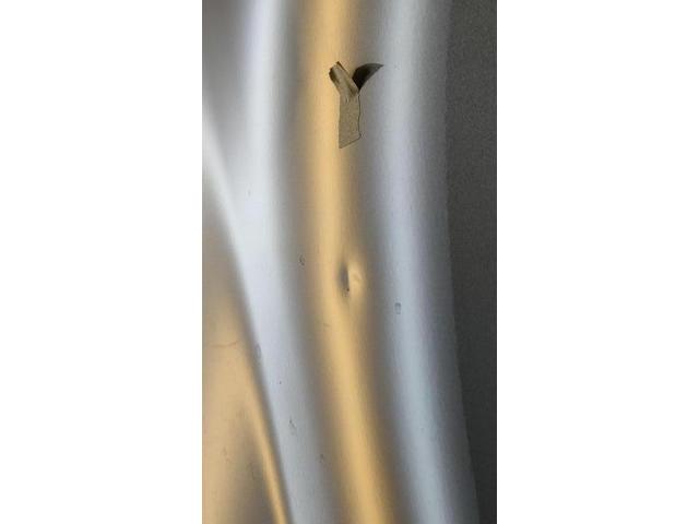 ダイハツ ロッキーのリアドアのへこみのデントリペア