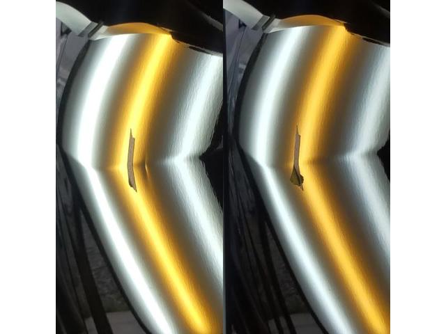 スバル レヴォーグのフロントドアのプレスライン上のへこみのデントリペア