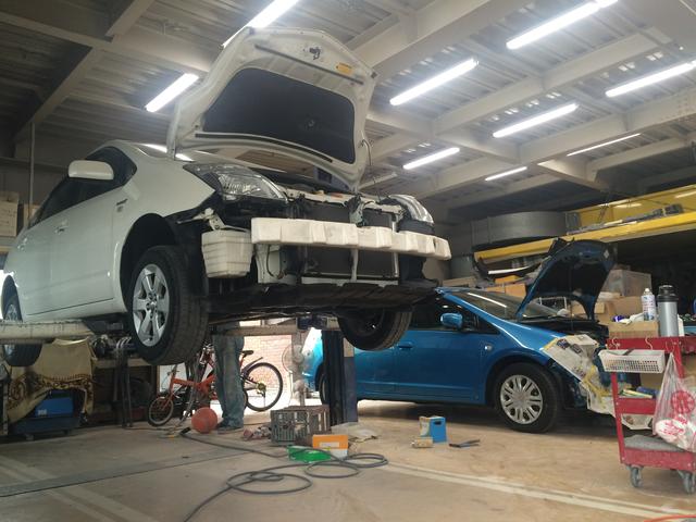 地下鉄岩塚駅すぐにある新車・中古車販売、修理・点検を中心に１００円レンタカーも行っています。