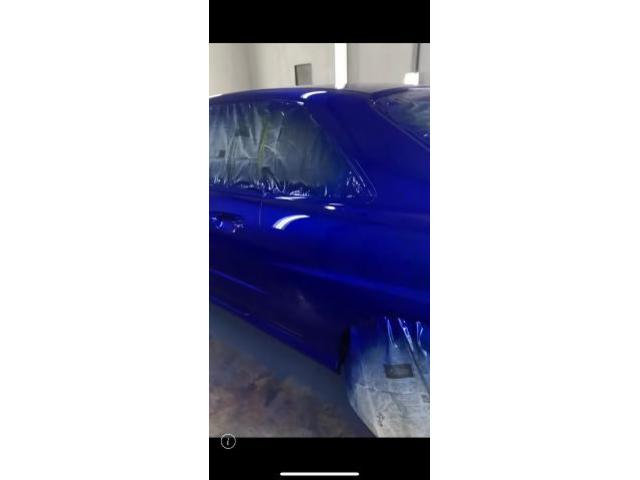 日産　スカイライン　前塗装　GTRブルー　　カーボンクリア塗装　フロントリップ取り付け　キズ修復　