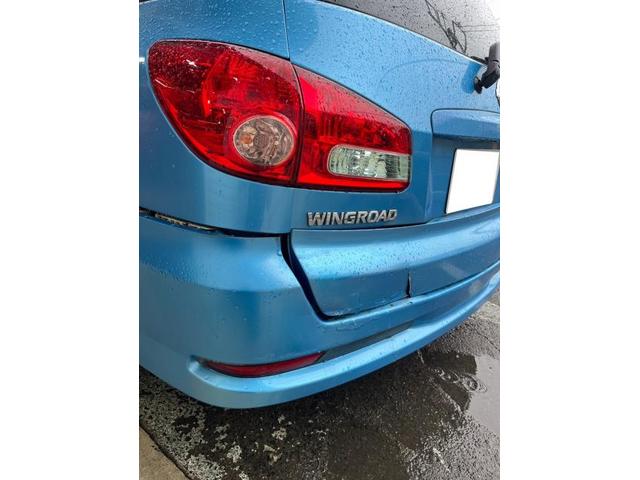 【日産　ウイングロード】【リア部分の激しい変形、キズ　部品交換および鈑金塗装、溶接による修理