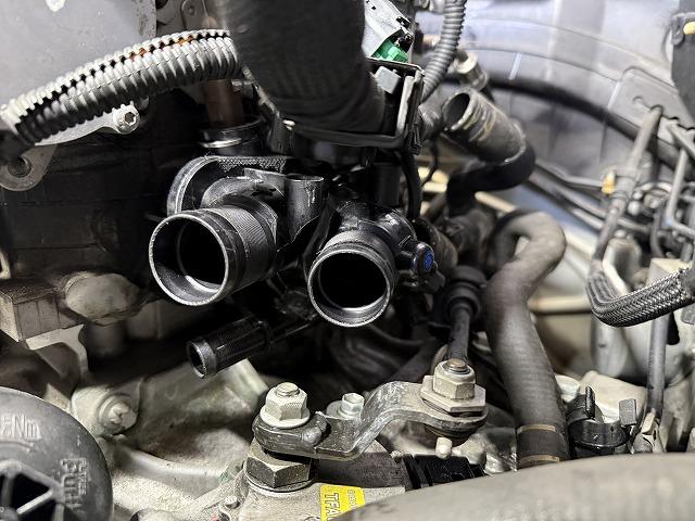 滋賀オートライフハノ　輸入車「MINI」(ZF16)の冷却水漏れ修理（サーモスタッドハウジング、ウォーターパイプ交換）