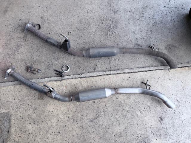 トヨタ ヴォクシー 車検整備 マフラー溶接修理 テールパイプ交換 リヤキャリパマウンティングブラケット交換 ディスクロータ 修理