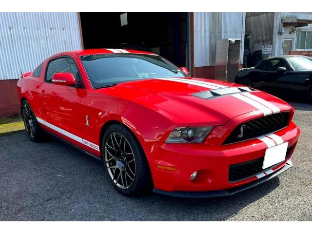 R5/04 中古車情報 2011 マスタング シェルビー GT500 アメ車 広島 NUTS V8 スーパーチャージャー 680馬力仕様 6速M/T 新車並行 エアクリーナ マフラー 3連メータ アラゴスタ 車高調 ウィルウッド ブレーキ